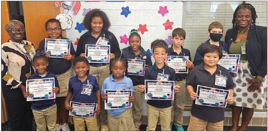 South Plaquemines Elementary School is proud to present its honorees who were recognized as Students of the Month for August. We are proud of our students for exemplifying positive behavior expectations. Congratulations to each of you. Keep up the good work. Pictured in the back row, from left: Mrs. Redmond, Sa'mi Parker, Kynsli Tyler, Yari Marston, Ayden Terrebonne Keegan Hampton, and Dr. Barrett. Front row: Denver Washington, Bronx Parker, Mia Espadron, Ryan Tyler, and Wade Nguyen.