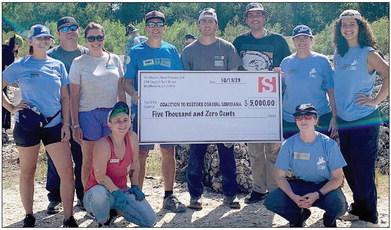 Stolthaven Terminals in Braithwaite presented a check for $5,000 to the Coalition to Restore Coastal Louisiana (CRCL) to help with coastal restoration efforts.