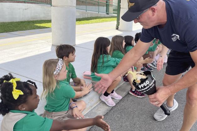 On May 18, members of the Plaquemines Parish Sheriff's Office (PPSO) participated in one of Sheriff Jerry Turlich’s favorite events, the annual PPSO Law Enforcement Torch Run for Special Olympics. PPSO thanks the Jefferson Parish Sheriff's Office and the Kenner Police Department for joining them for visits to the schools throughout Plaquemines Parish and a special thanks to the schools for helping PPSO support such a great cause.