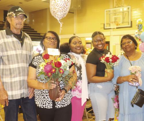 Pictured is Mrs. Brenell Alexis (second from the left) with her family at the awards ceremony.